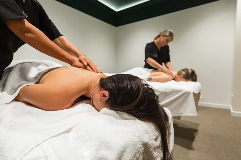 Massage at Lovoir — a therapist giving a client a full body massage